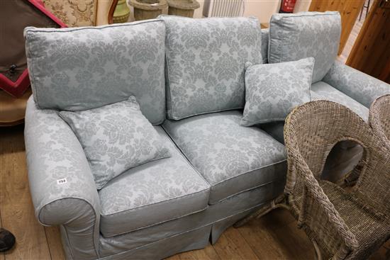 A turquoise upholstered two seater settee and matching armchair, Settee W.150cm